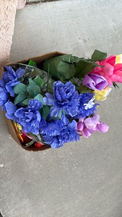 Box of artificial flowers and such