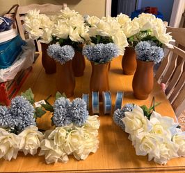 7 terracotta color vases with dusty blue flowers & white flowers 4 blue ribbons $200