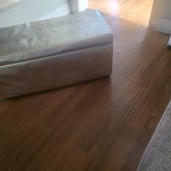 Gold storage ottoman