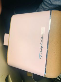 Pink refrigerator for drinks