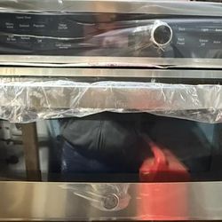 GE Over-the-range Microwave-stainless Steel Model JVM7195SKSS Brand new (open Box)
