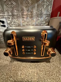New 4 slice toaster black & copper