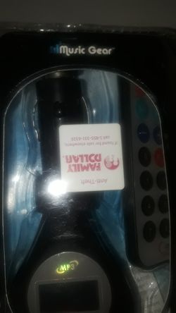 ,free with one purchase ..., Music gear ...wireless transmitter player and it play music in car radio with remote.. brand new