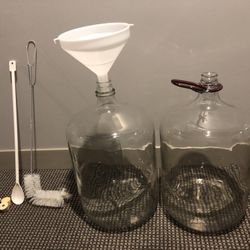 Two 6.5 gal glass carboys 