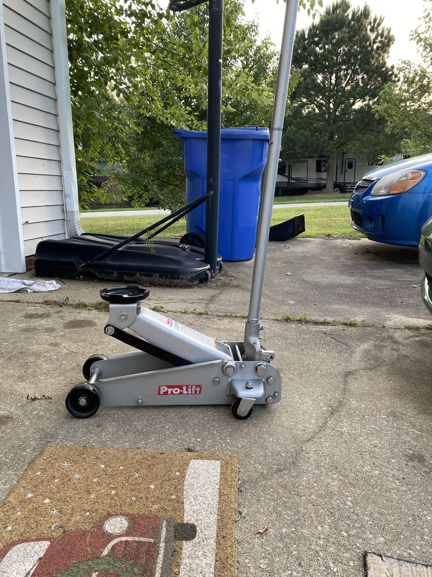 Pro Lift Hydraulic Lift And Larin 2 Ton Jack Stands