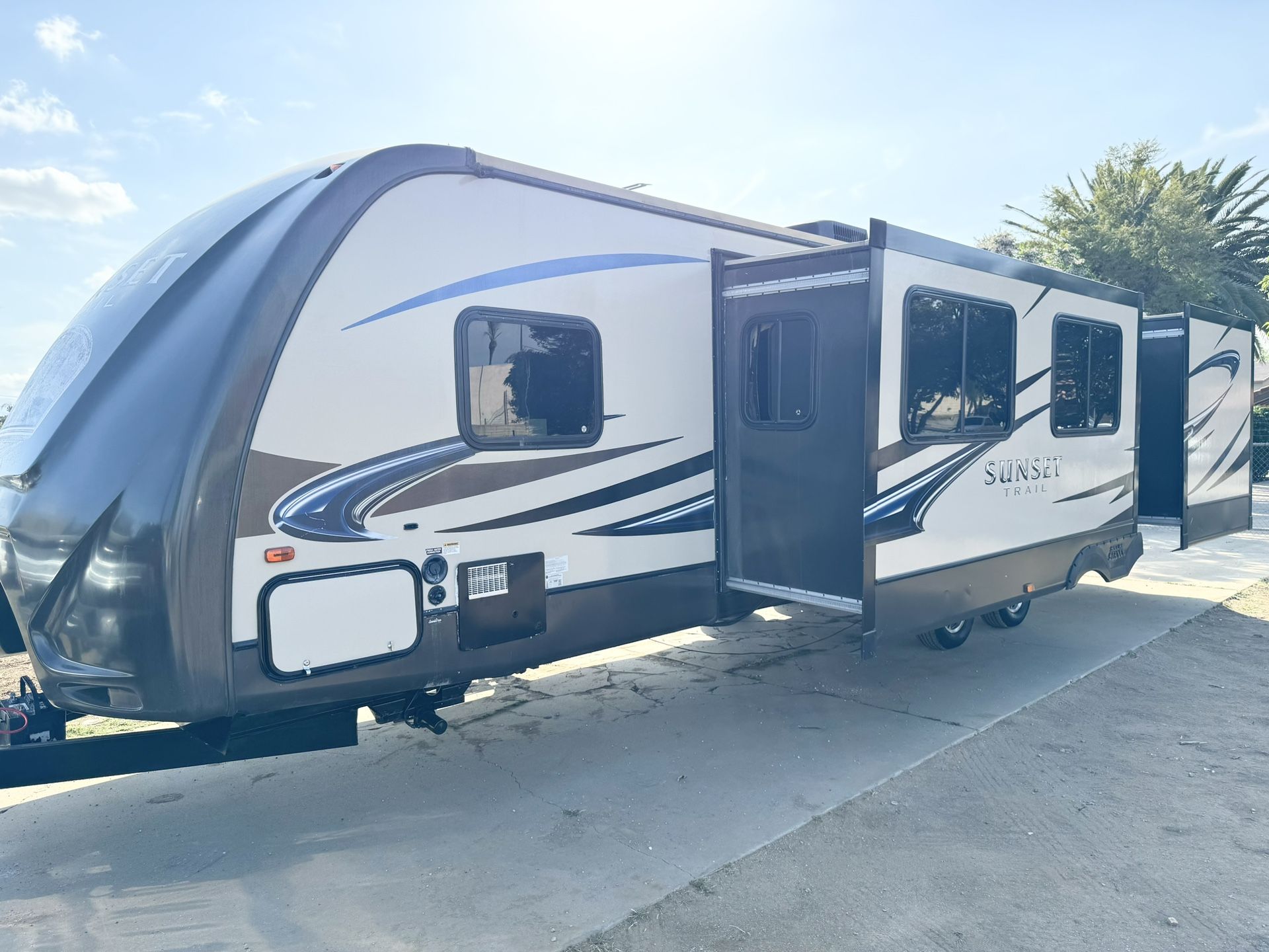 Selling my 2014 Forest River by Sunset travel trailer double slide outside kitchen 