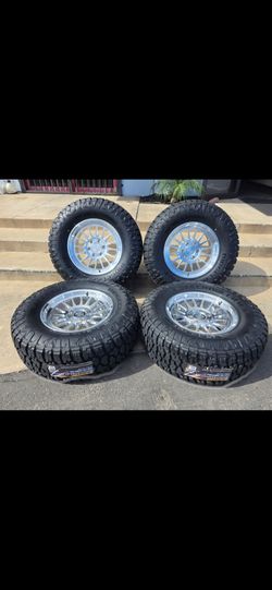 18" KM447 billets w/ 35x12.50R18 RT tires