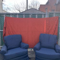 Two Vintage Swivel Rocking Chairs