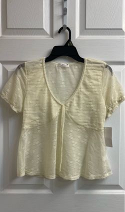 Brand new Juniors ivory short sleeve top size XL