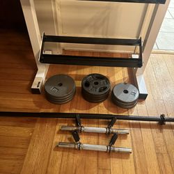 Dumbbell Rack 7 1/2 Pounds (4) 7 1/2 Pounds (4) 5 Pounds (4) Adjustable Dumbbells And Straight Bar All with Clips 
