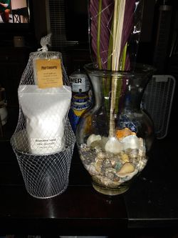 PIER 1 CANDLE AND PAIL AND GLASS VASE WITH FLOWERS