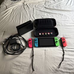 Nintendo Switch V1 with Controllers, Dock, Cables, Carrying Case, and Games