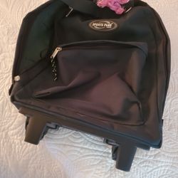 Traveler's Backpack With Handle And Wheels