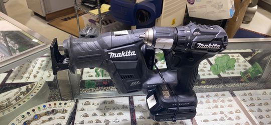 Makita 3pc set, drill/reciprocating saw/impact drill. With 2 batteries and charger