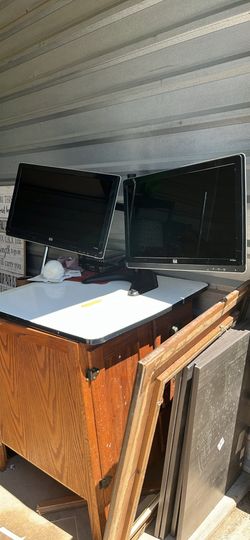 Two monitors on stand