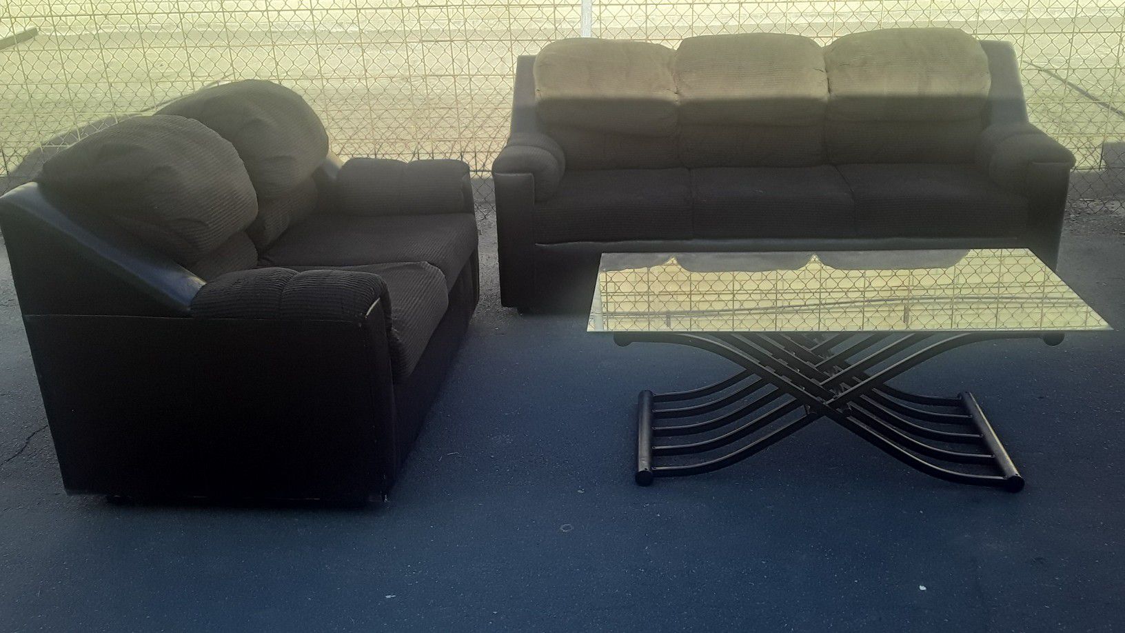 Loveseat and couch and coffee table