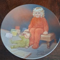 This item is a Bessie Pease Gutmann collector plate titled "Waiting for Daddy"