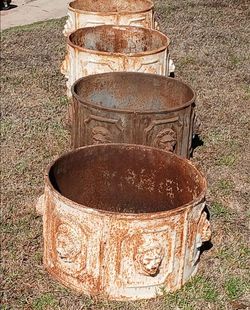 Pair of Cast Iron Lion Head Planters ( 21x21x12)