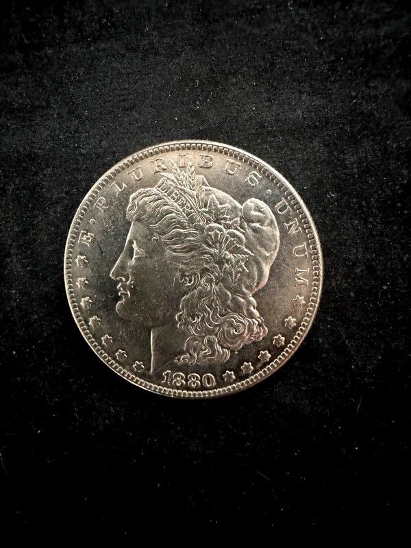 1880 CC Morgan Silver Dollar. Nice High Grade Coin. Looks Almost Uncirculated.