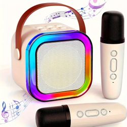 Portable wireless karaoke sound system with dual handheld microphones