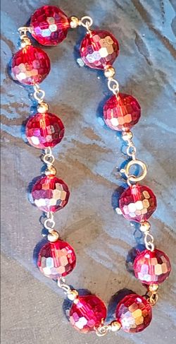 Red bead? & gold bracelet