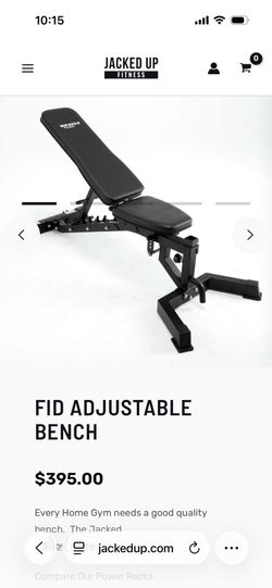 Jacked up fitness bench with preach curl attachment and leg curl attachment