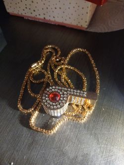 DAZZLING DIAMOND-ENCRUSTED.\N WHISTLE AND NECKLACE ASSEMBLE.