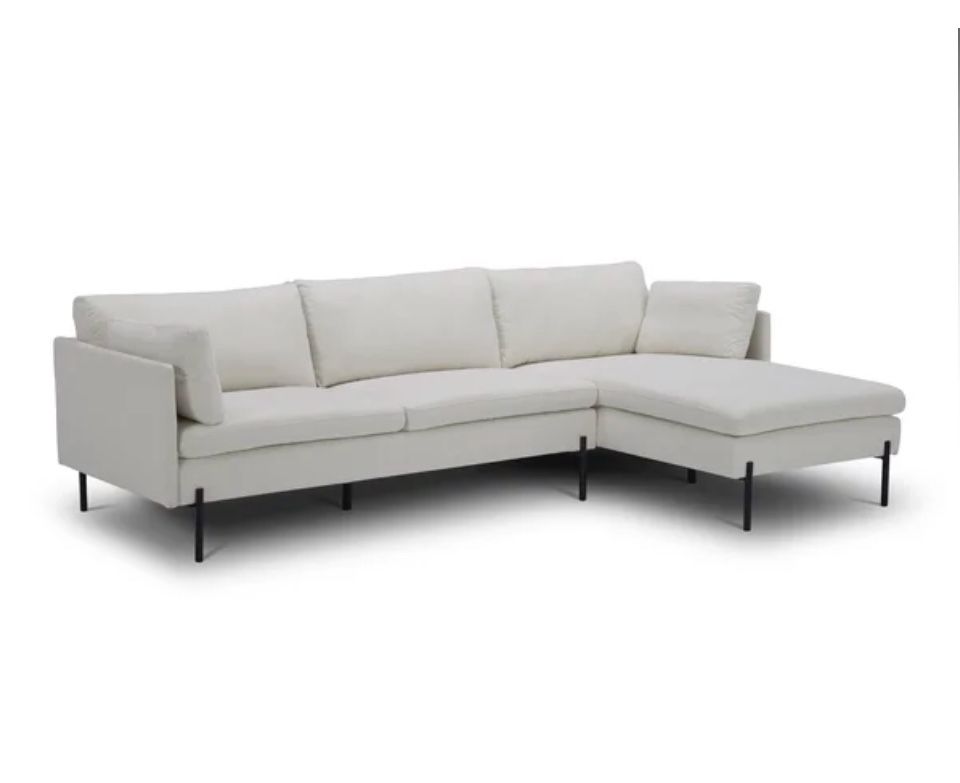New in the Box 102" Wide Right Hand Facing Down Cushion Sofa & Chaise.  Fabric: White with Cream  Down Fill Cushions Plush Seat Seat Depth: Standard (