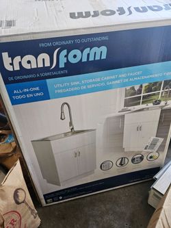 Utility sink storage cabinet and faucet