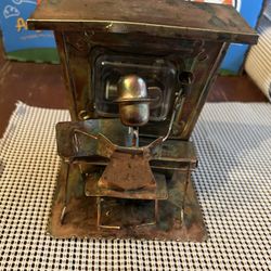 Old Timey Musical Tin Piano Playing Man