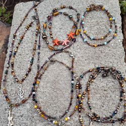 Glass Beaded Necklaces, an Assortment of Bracelets & Anklets