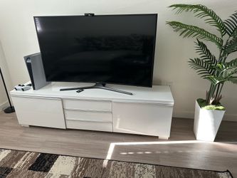 need gone today…55 inch curved Samsung smart tv and White  75inch tv stand from ikea