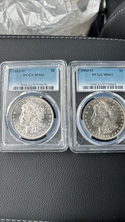 1883-O Morgan Silver Dollar PCGS MS63 — Pair