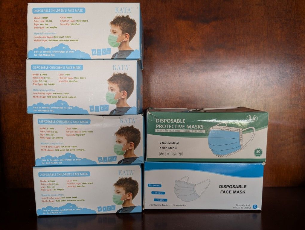 Brand New Face Masks 4 Boxes Of Kids And 2 Adults 50 Masks Per Box