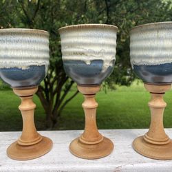 3 handcrafted pottery wine goblet with a wooden stem. New