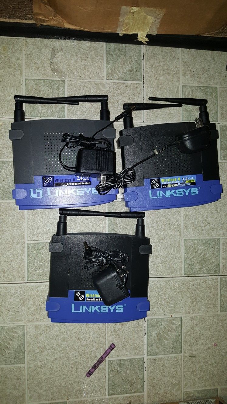 2 Linksys Wireless-g 2.4 GHz Broadband Router