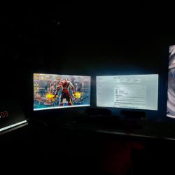 Pc Gamer And 4 Monitors