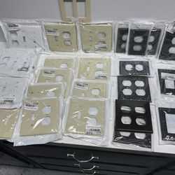New 25 Plastic Electrical Wall Plates. $5 Takes All. Must Pick Up