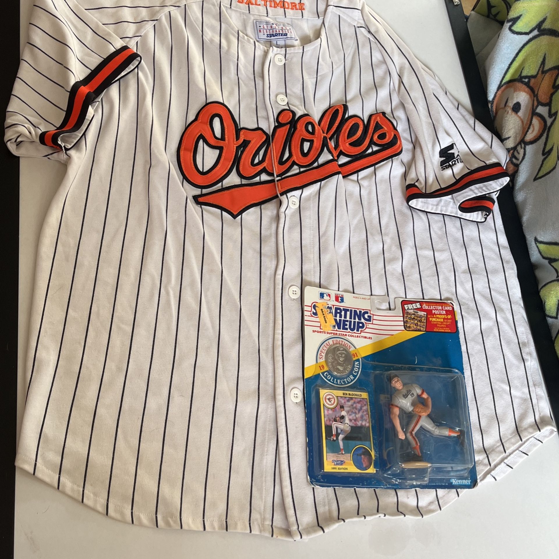 Vintage Orioles jersey and figurine Ben McDonald