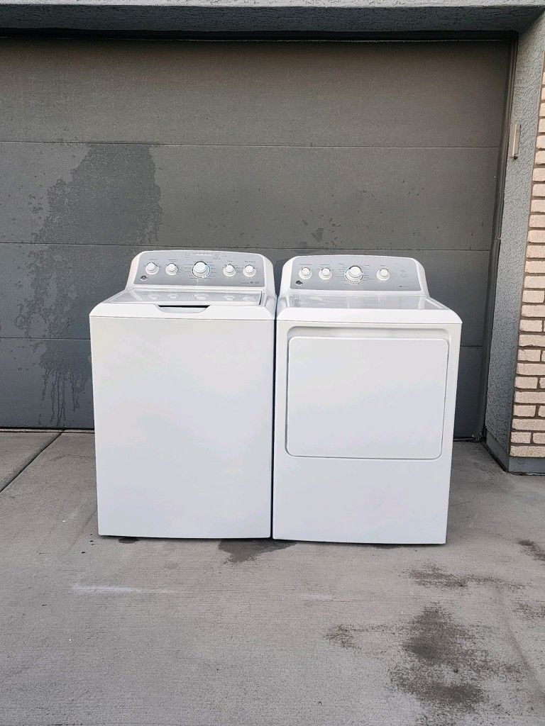"GE" MATCHING SET TOPLOADER WASHER & ELECTRIC DRYER KING SIZE CAPACITY PLUS IN VERY GOOD CONDITION 4 MONTHS OF WARRANTY DELIVER & INSTALLATION FREE