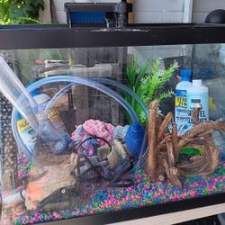 FISH AQUARIUM WITH TONS OF ACCESSORIES 