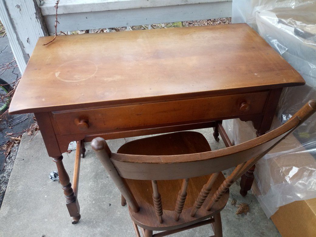 Antique desk with drawer and fancy chair
