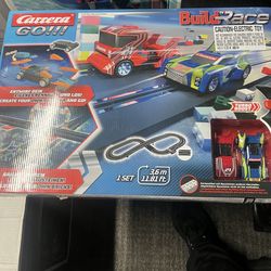 Carrera GO!!! Build 'N Race 11.81-ft Electric Powered Slot Car Race Set.