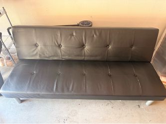 Futon couch turns into twin size bed