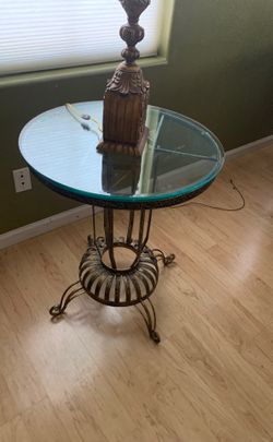 Glass end table iron and glass top28 inches height