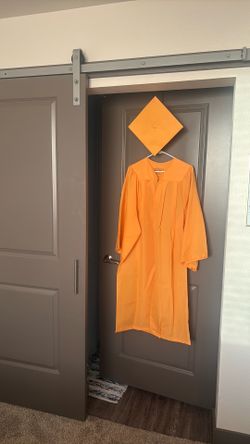 Yellow graduation cap and gown