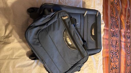 Navy carry on suitcase w/free new bag