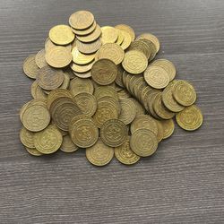 Vintage lot brass Chuck E. Cheese tokens total 93. Earliest date 1982