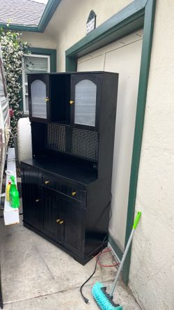 Cabinet with remote lighting