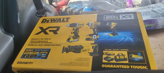 4 tool combo and 2 pack 4 amp battery